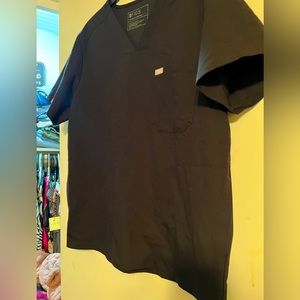 Figs scrub top , size “ L “ excellent condition “with pockets “